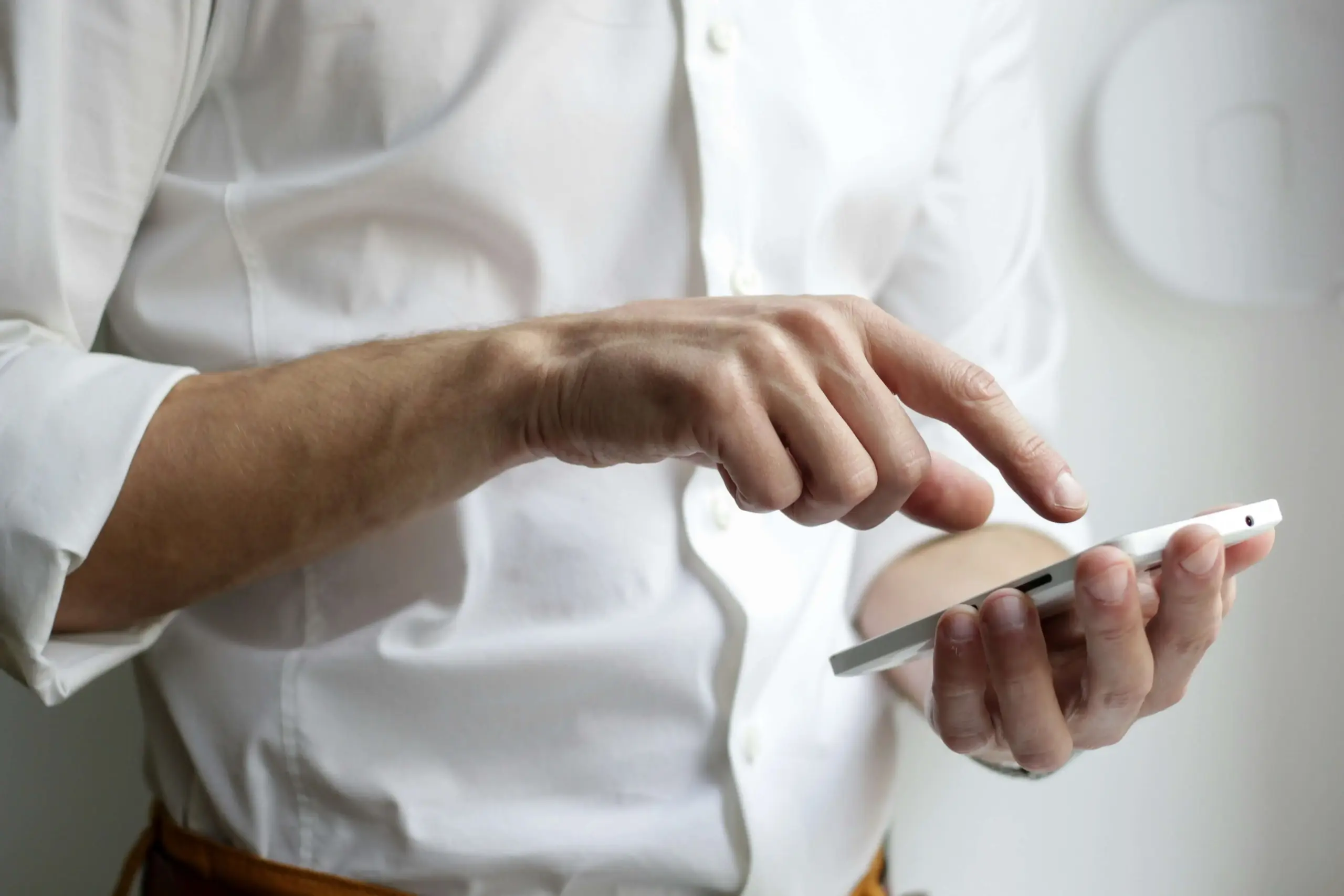 man looking at phone
